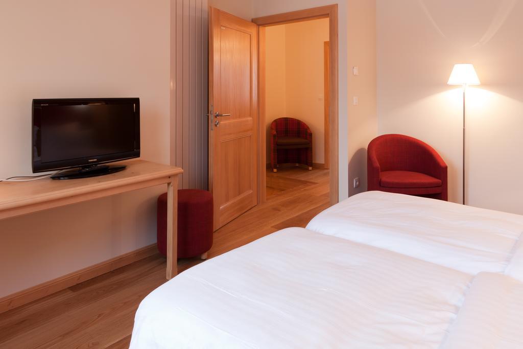 Appartements La Maison Du Tigre Stutzheim Quarto foto